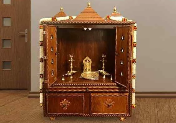 Traditional Mandir Unit On The Floor Featuring CNC-Cut Wooden Panel